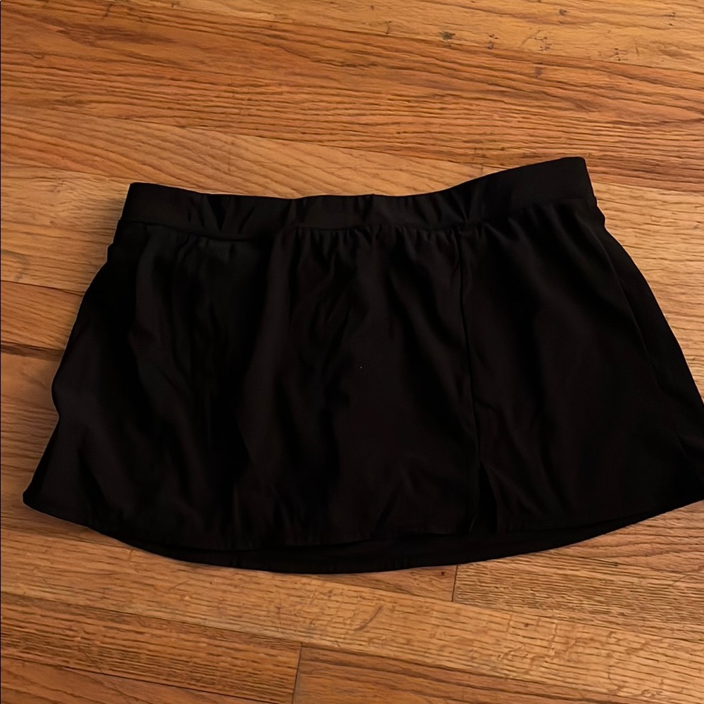 XL black swim skort with small slit in front